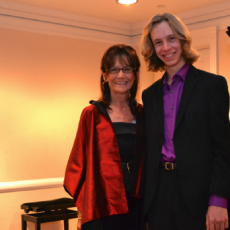Salon board member Monique Schoen-Warshaw with pianist Baron Fenwick